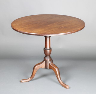 A 19th Century mahogany  snap top tea table, raised on a column and tripod base 90cm h x 84 cm diam. 