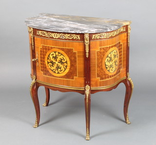 A 20th Century French D shaped Kingwood commode with veined marble top enclosed by a paneled door and having panelled inlaid decoration, raised on cabriole supports with gilt metal mounts 72cm h x 70cm w x 41cm d 
