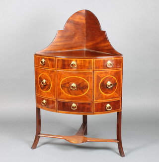 A Georgian mahogany corner wash stand with three-quarter gallery, the base fitted 1 long drawer, retaining original bowl receptacles, raised on oustwept supports with undertier 116cm h  x 71cm w x 49cm d  