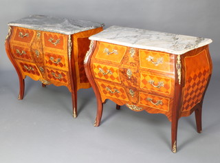 A pair of French 20th Century Kingwood commodes of bombe form with veined marble tops and gilt metal mounts, fitted 3 long drawers, raised on cabriole supports 77cm h x 90cm w x 41cm d 