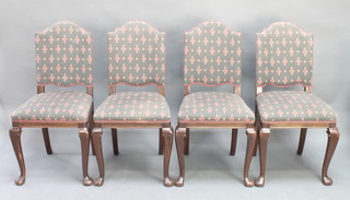A set of 4 Queen Anne style mahogany framed dining chairs with upholstered seats and backs

