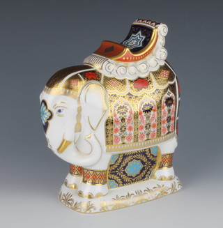 A Royal Crown Derby Imari pattern paperweight in the form of a standing elephant with gold stopper 21cm, boxed 