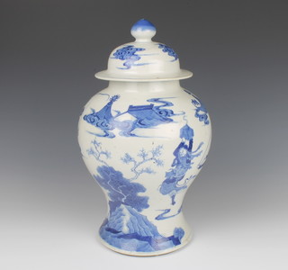 A 19th Century Chinese blue and white oviform vase and cover with simple knop finial, decorated with figures in an extensive landscape, 37cm h  