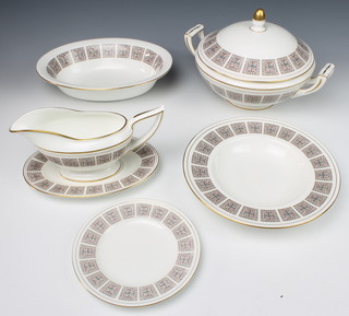 A Minton Acanthus pattern part dinner service comprising 12 small plates, 6 medium plates, 9 large plates, 5 soup bowls, 3 serving dishes, 2 meat plates, a sauce boat and stand and 2 tureens, most with a special service mark 