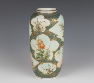 A Japanese oviform vase decorated with panels of flowers 25cm 