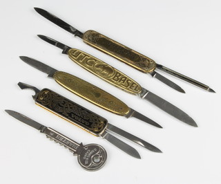 5 advertising pocket knives including a Swedish advertising lobster pocket knife stamped Eka the grip showing Volvo and Swedish Royal Coat of Arms, a knife advertising Furrer & Co Zurich blade stamped Surrich, Philips Agenta and UTC Basel and a key knife for B.Nahas & Co. of Cairo 
