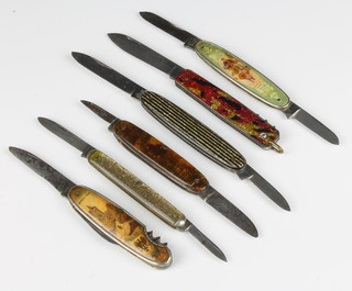 6 decorative pocket knives with plastic coated handles including a gold speckled knife stamped L.F & Co USA and 2 early celluloid covered German souvenir knives 