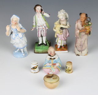 An Edwardian bisque figure of a chinaman with nodding head 6cm, 4 porcelain figures, 2 thimbles and a rouge box 