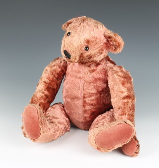 A red mohair teddy bear with articulated limbs 45cm 