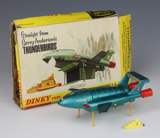 A Dinky 101 Thunderbird 2 complete with Thunderbird 4 in original box, the box is missing 1 flap 