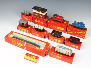A Triang Hornby OO gauge R.253 dock shunter in red livery, a Triang battle space radar tracking command car R.567 (missing aerials) boxed, together with items of Triang rolling stock boxed 