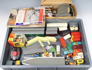 A Multipack DC controller, a Triang power unit, 1 other power unit, various items of rolling stock, 2 1970's Hornby catalogues 