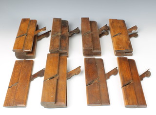 Thirteen various wooden moulding planes 