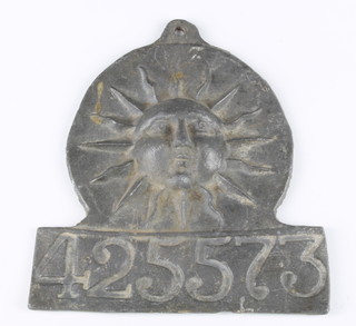 A reproduction lead Insurance plaque decorated sunburst marked 425573 20cm x 17cm 
