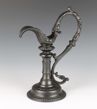 A Victorian decorative cast iron ewer 33cm x 15cm