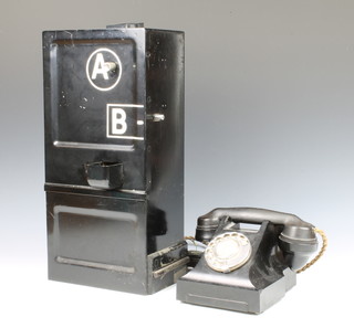 A black Bakelite dial telephone the base marked 328F together with a metal press button A and B coin box 