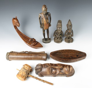 A carved African mask 5cm x 27cm x  8cm, 2 carved wooden figures 19cm x 7cm x 6cm and other ethnic carvings 