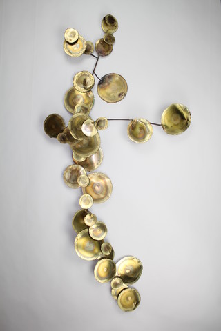 Sasa, a polished brass wall sculpture "Lily Pads" 180cm h x 83cm w signed