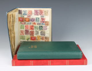 Two albums of GB, Commonwealth and world stamps together with a stock book of world stamps 