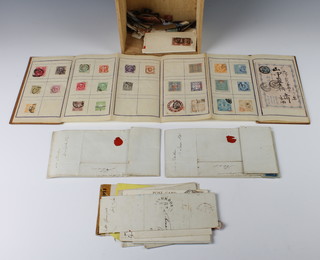 A small album of Japanese stamps, a collection of Victorian and franked envelopes, penny reds etc 