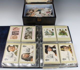 Two albums of post office PHQ postcards together with a collection of loose cigarette cards contained in a rosewood box 