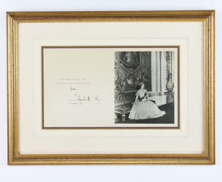 Of Royal Interest, a framed and glazed Christmas card signed from Elizabeth R, with black and white image of seated HM Elizabeth, the Queen Mother 19cm x 32cm 