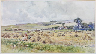 J Whipple, watercolour signed, a haymaking scene with figures, carts and distant buildings 28cm x 49cm 