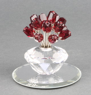 A Swarovski Crystal vase of roses on a mirrored base 7cm