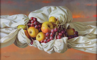 Antonio Morano, (b.1943) oil on canvas, signed, still life study of apples and grapes enclosed in a sheet 45cm x 72cm 
