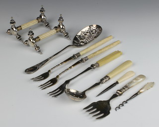 A pair of Edwardian silver plated and ivory knife rests and minor cutlery 