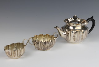 A Victorian repousse silver Bachelor's tea set with ebony mounts, Sheffield 1899/1900, gross weight 366 grams 