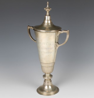 An Art Deco silver 2 handled presentation trophy cup and lid with presentation inscription Birmingham 1935, maker Adie Brothers, 660 grams, 34cm h 