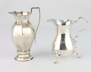 An Edwardian octagonal silver cream jug, London 1906, 12cm, a Georgian style ditto 268 grams 