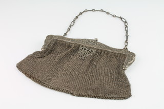A Continental silver mesh evening bag with fancy clasp 299 grams 