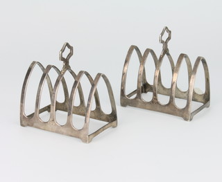 A pair of silver 5 bar arched toast racks Sheffield 1940, 107 grams