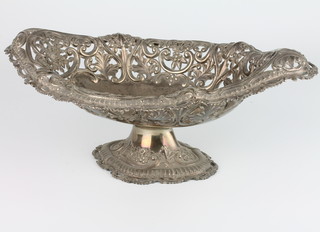 A Victorian repousse silver bowl with pierced scroll and floral decoration London 1894, maker William Hutton & Sons Ltd, 474 grams, 31cm 