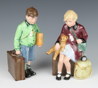 Two Royal Doulton figures - The Boy Evacuee HN3202 2620/9500 20cm and The Girl Evacuee HN3203 2332/9500 19cm 