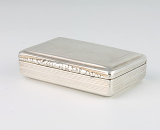 A William IV rounded rectangular silver snuff box with engine turned decoration and fancy thumb piece Birmingham 1835, maker Nathaniel Mills 8.5cm x 5.5cm, 90 grams 