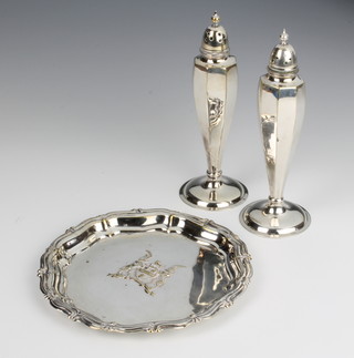 A pair of silver plated octagonal shakers and a plated card tray 