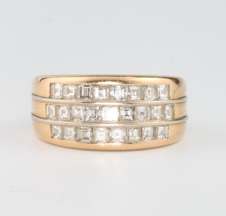 Cartier, a lady's 18ct yellow gold princess set diamond triple ring, dated 1990/9165, size J 1/2