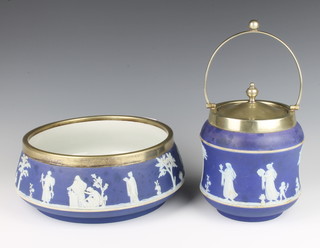 A Wedgwood blue Jasperware salad bowl with plated rim 20cm, a do. biscuit barrel 17cm 