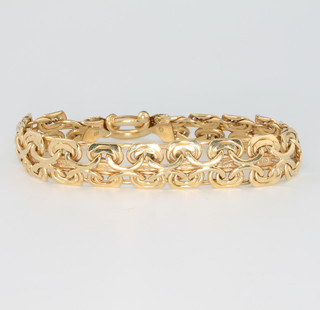 A 9ct yellow gold fancy flat link bracelet, 11.8 rams, 17.5cm 