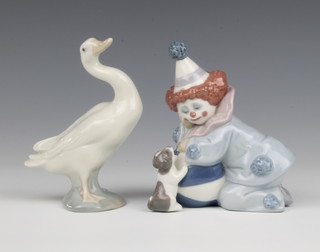 A Lladro figure of a standing goose, base impressed 0-4S 12cm together with a do. seated clown base impressed 5278 12cm 
