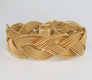Kern, An 18ct yellow gold woven link stiff bracelet, 64 grams 