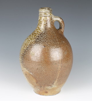 An 18th Century Continental Bellarmine jug of plain form with ring neck and mottled body 29cm 