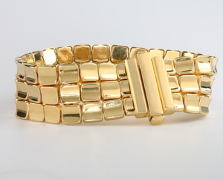 A 9ct yellow gold wide articulated bracelet, 23.6 grams, 17cm 