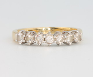 An 18ct yellow gold 7 stone brilliant cut diamond ring, approx. 0.5ct size L 1/2