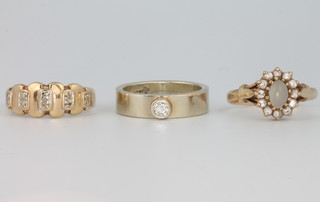 Three 9ct gold gem set rings, size M 