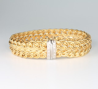 A 9ct yellow gold flat link wide bracelet with diamond set terminals 20.7 grams, 19cm 