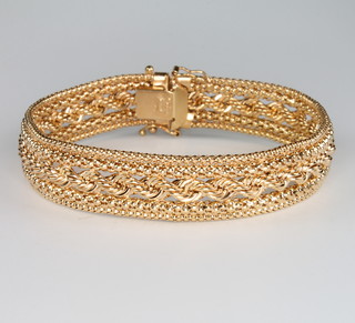 A 9ct yellow gold fancy flat link bracelet 12.9 grams, 19cm 